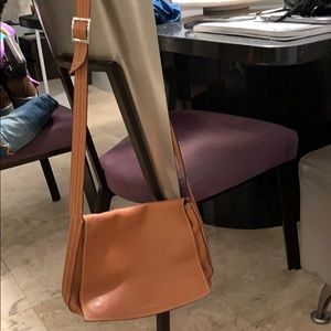 Super Nice Carmel Colored cross over saddle bag